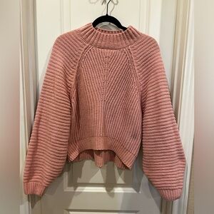 Pink Sweater Size Large. Like new condition, soft, comfortable and flattering.
